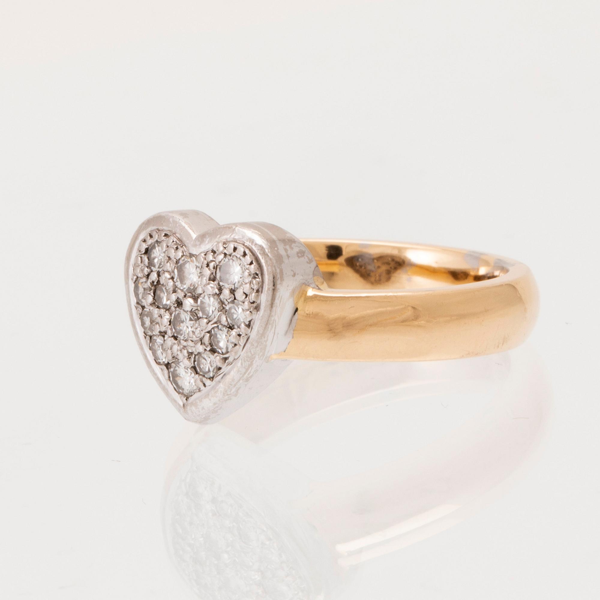 An 18K white and red gold ring set with round brilliant-cut and single-cut diamonds, Björn Nilsson Kristianstad 2008.