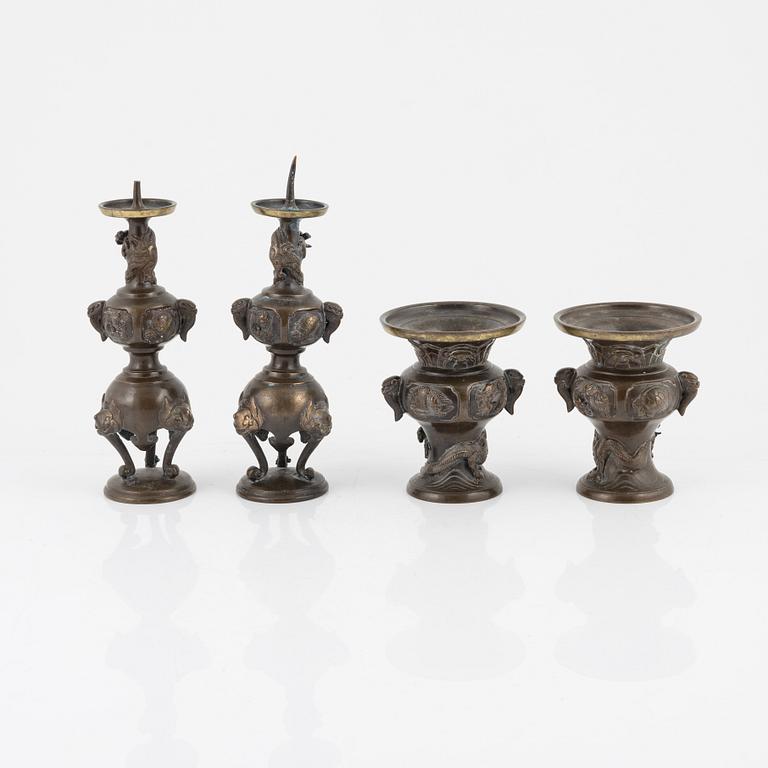 A pair of Japanese bronze candleholders / censers and a pair of decorative vases, Meiji (1868-1912).