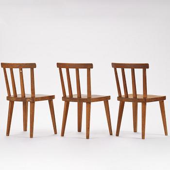 Axel Einar Hjorth, a set of three stained pine "Utö" chairs, Nordiska Kompaniet, Sweden, 1930s.