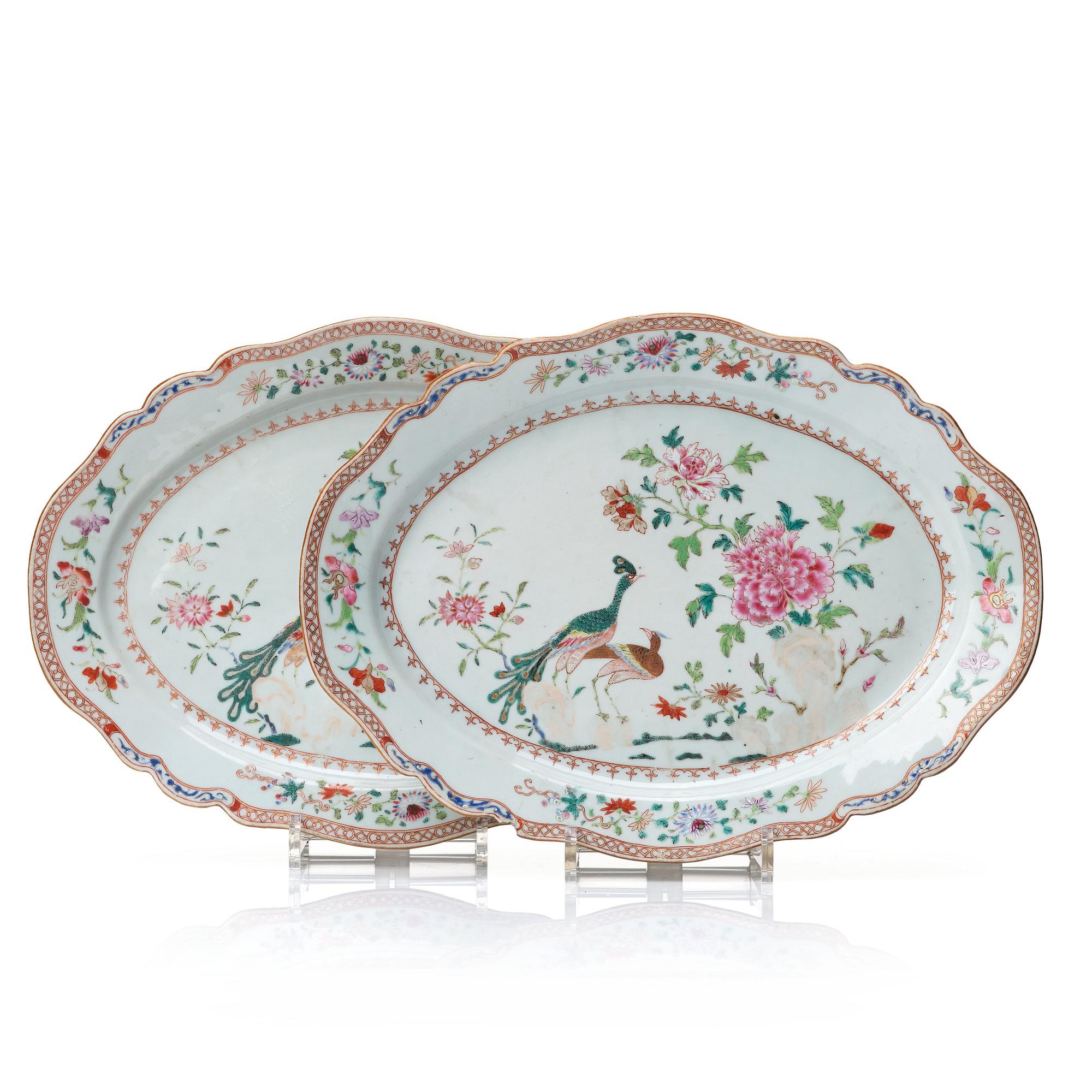 A pair of famille rose 'double peacock' serving dishes, Qing dynasty, Qianlong (1736-95).