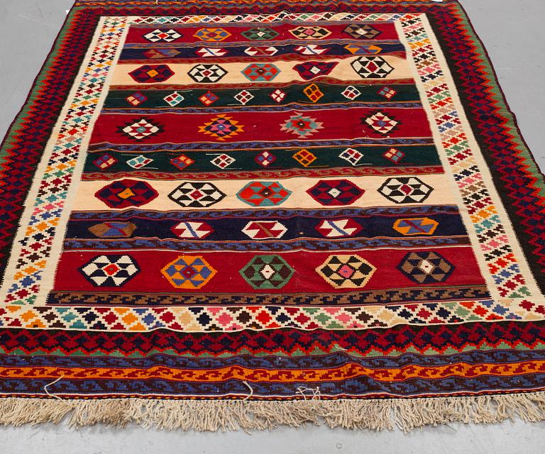 A CARPET, Persian kilim, ca 240 x 167 cm.