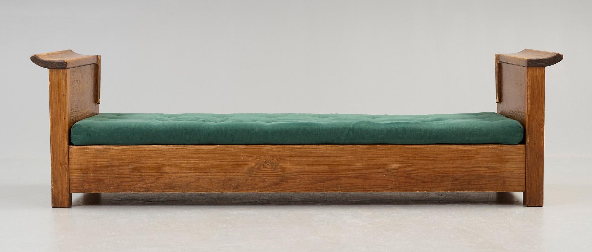An Axel Einar Hjorth stained pine sofa 'Sandhamn', by Nordiska Kompaniet ca 1929.