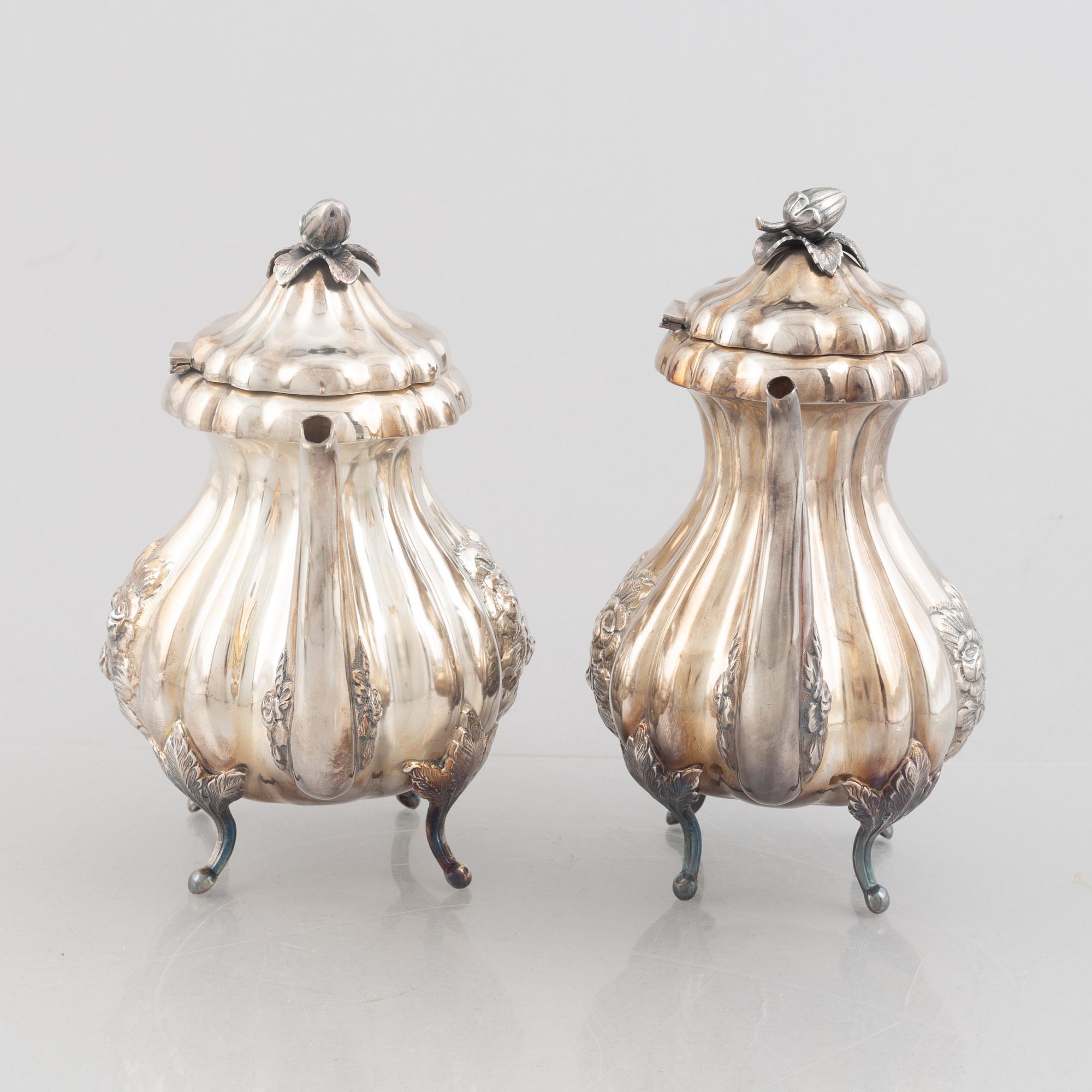 An Austrian silver coffee pot, tea pot, cream jug and sugar bowl, Vienna 1826.