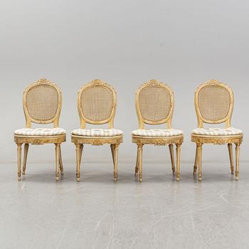 A set of four Louis XVI-style chairs from the early 20th century.