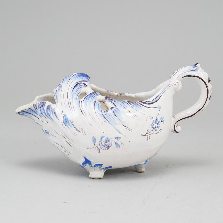 A Swedish Marieberg faience sauce boat, 18th Century.