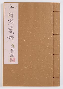 A book, four volumes, numerously illustrated with woodcuts in colours, "Shi zhu zhai jian pu" by Hu Zhengyan.