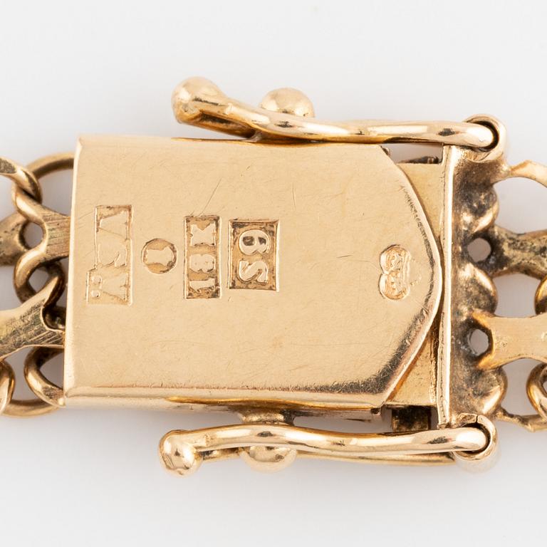 18K gold bracelet.
