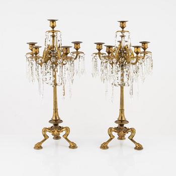 A pair of bronze candelabra, late 19th Century.