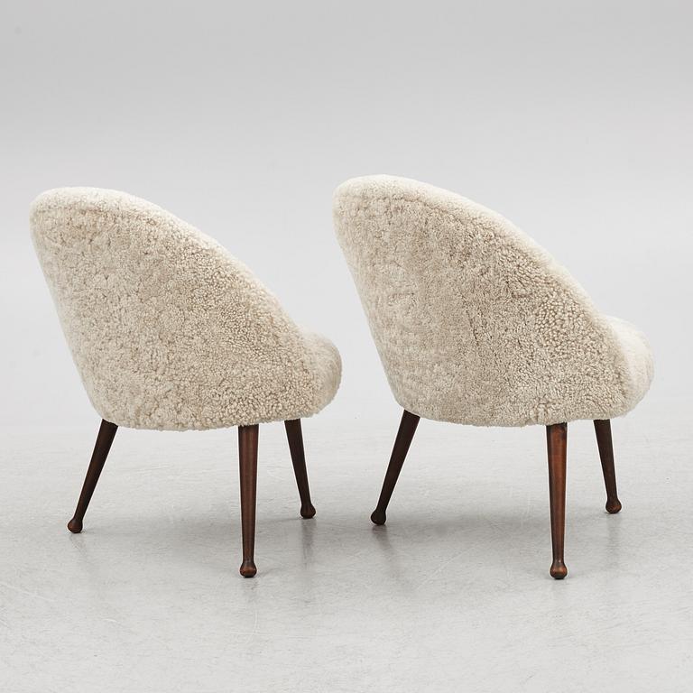 A pair of Scandinavian Modern lounge chairs, 1950's.