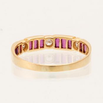 Ring in 18K gold with baguette-cut rubies and round brilliant-cut diamonds.