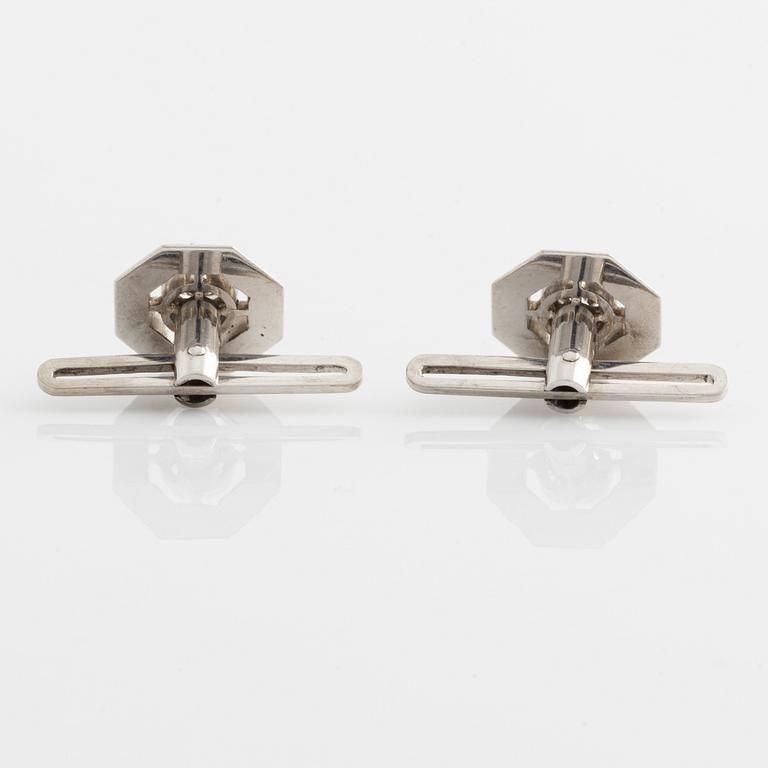 Smoking/skjortknappar, vitguld med briljantslipade diamanter.