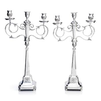 279. A pair of Swedish silver candelabras, marks of Pehr Zethelius, Stockholm 1797 and Daniel Hedberg, Eksjö 1829.