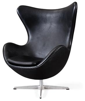 109. An Arne Jacobsen black leather and steel 'Egg Chair', Fritz Hansen, Denmark 2000.