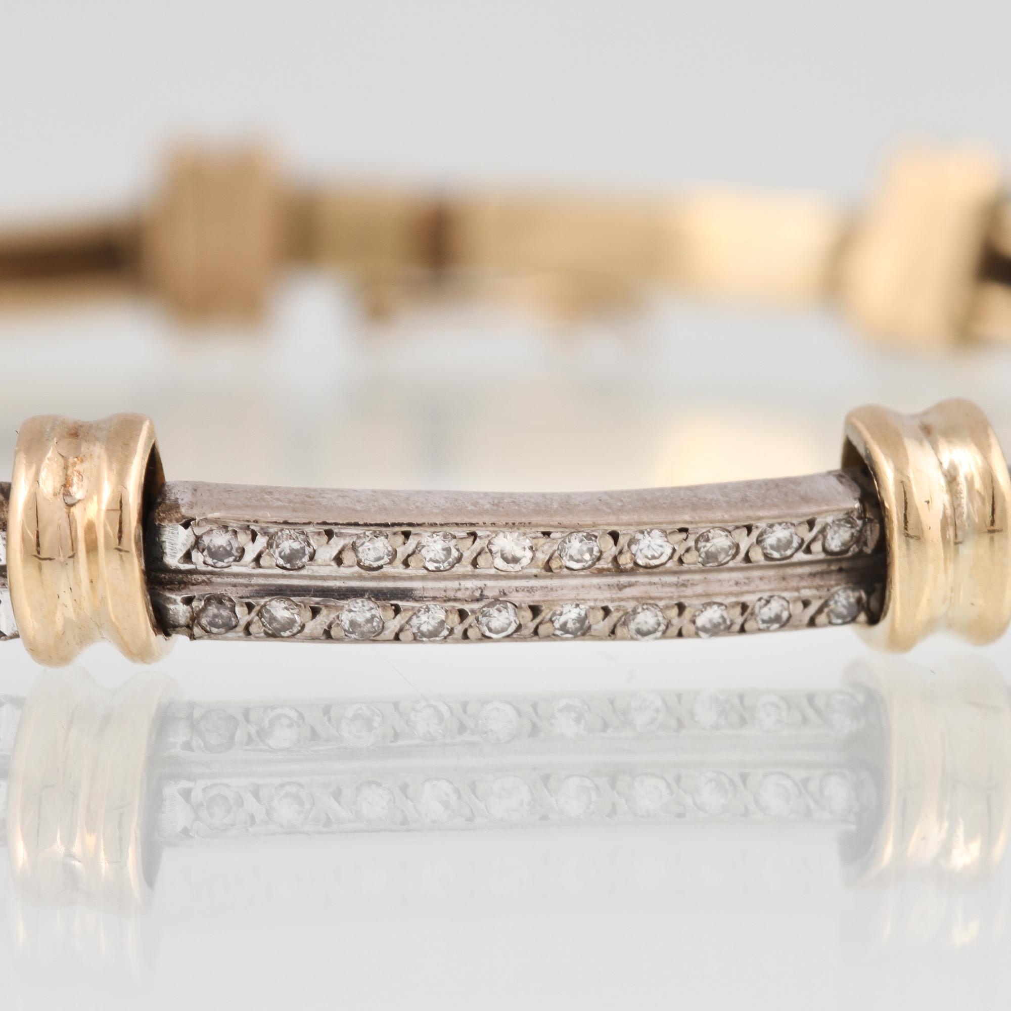 ARMBAND, 18K vitguld och guld med 60 små briljantslipade diamanter. Vikt 13,3 gram.