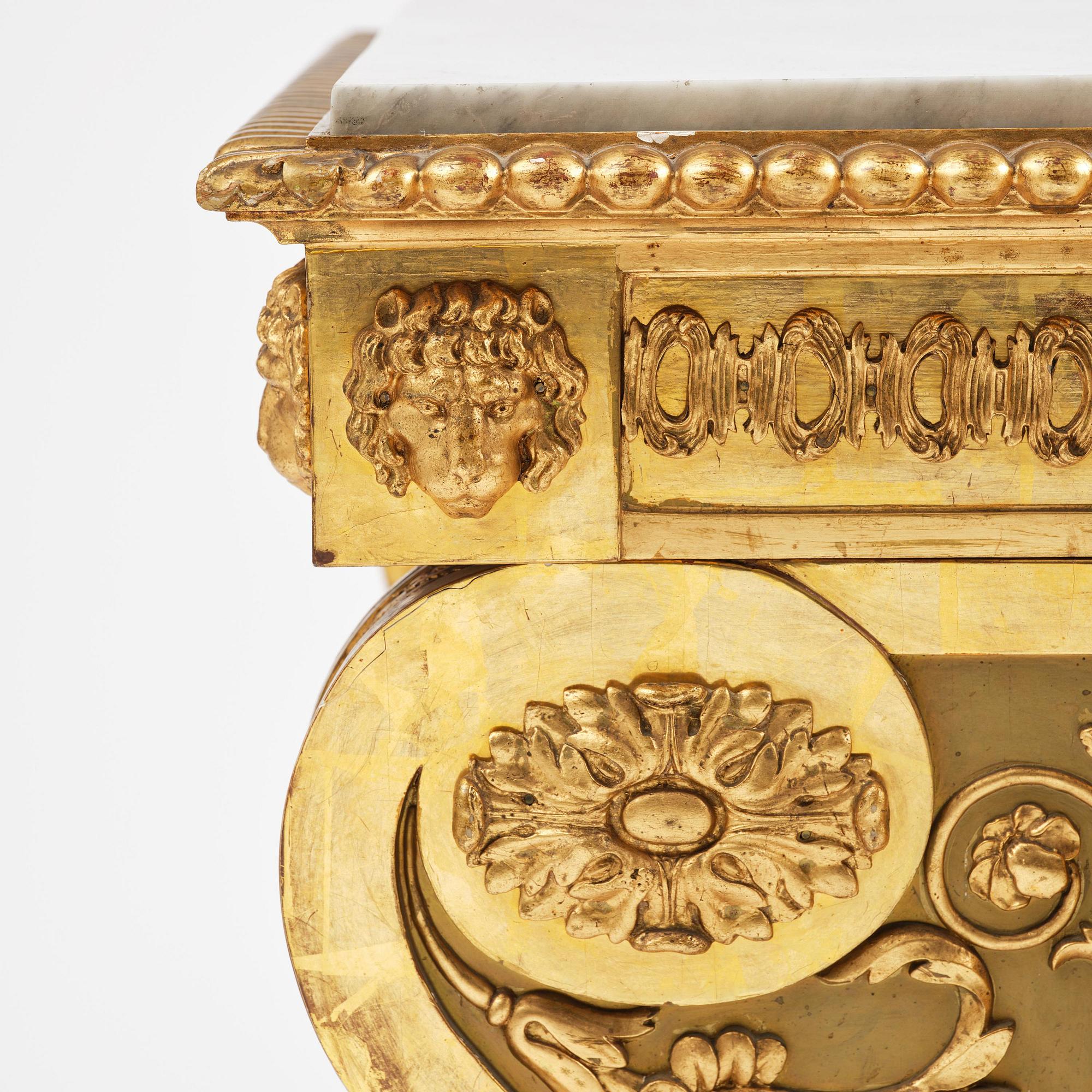 An Empire giltwood and gesso console table by P.G. Bylander (master in Gothenburg 1811-58).