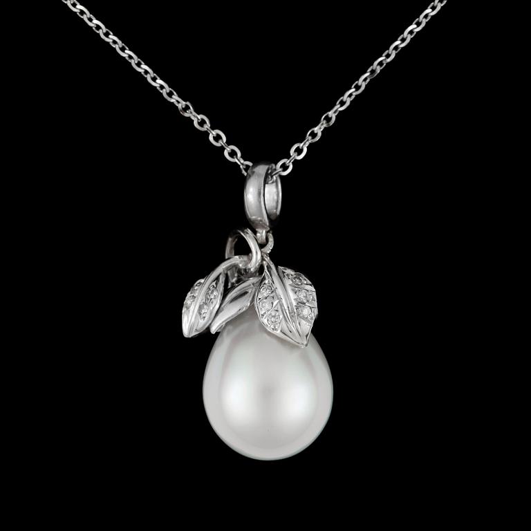 A South Sea pearl, circa 14.8 x 12.8 mm, and diamond, ca total 0.08 ct, pendant.