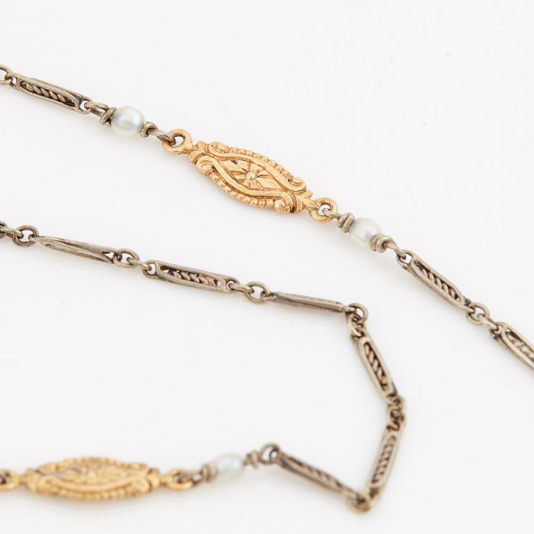 A chain and a pendant set with natural pearls and old-cut diamonds. Possibly early 20th century.