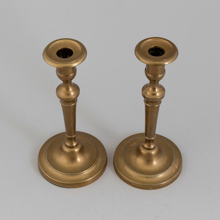 A PAIR OF BRONZE CANDLESSTICKS, 19th century.