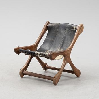 Don Shoemaker, a 'Sloucher' rosewood easy chair from Señal S.A.; Mexico, 1960's.