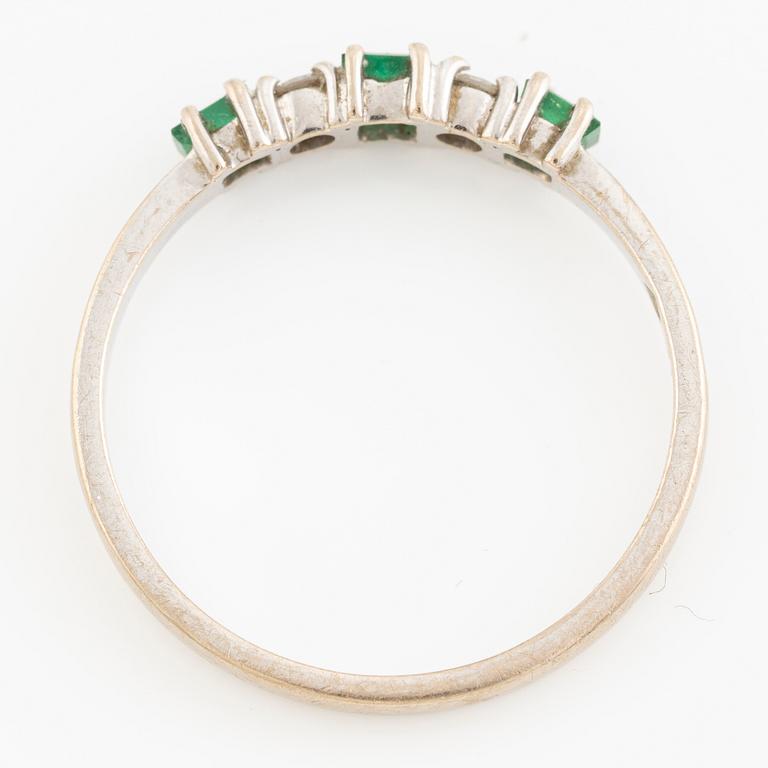 Ring, eternity ring 18K white gold with emeralds and brilliant-cut diamonds.
