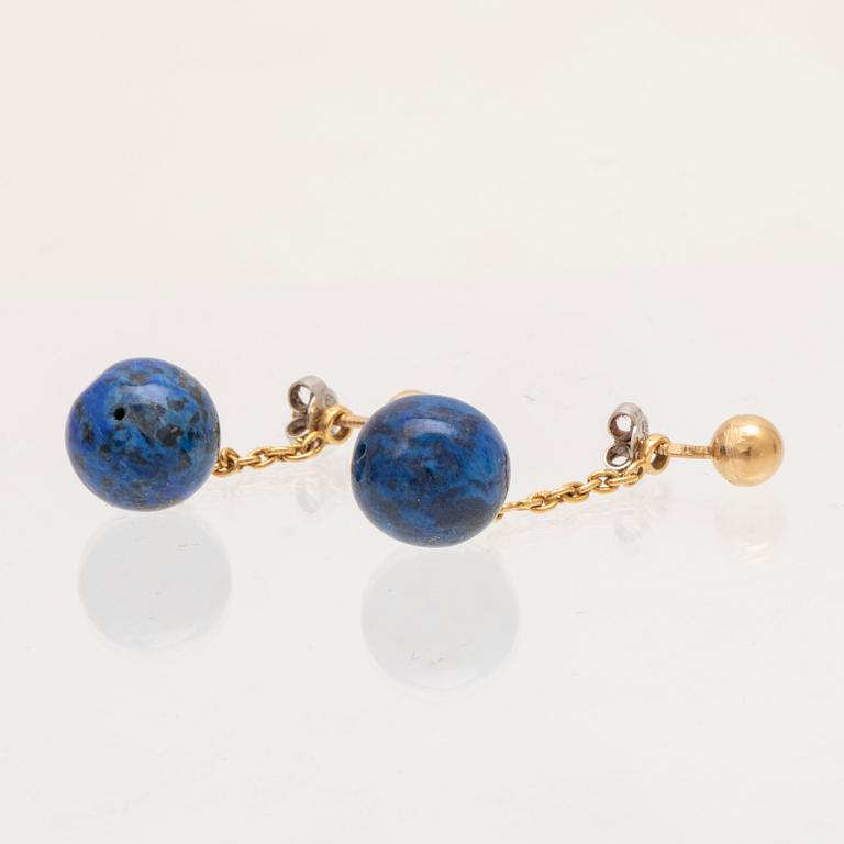 A set of lapis lazuli earrings and necklace.