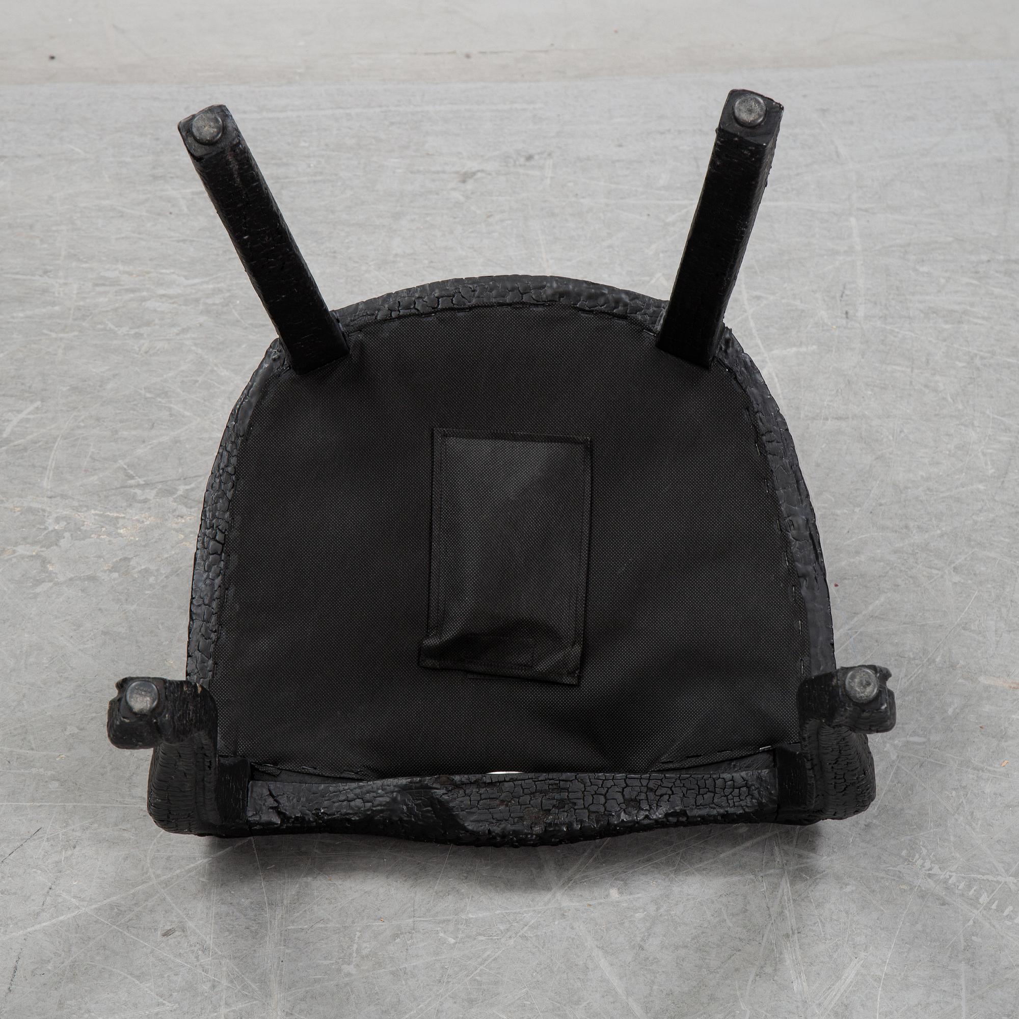 Maarten Baas, a promotional "Smoke dining chair" for Moooi,  after 2002.