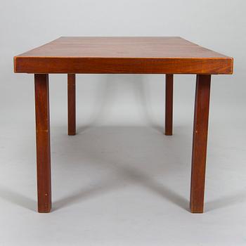 Carl Gustaf Hiort af Ornäs, a mid-20th-century 'Näyttely Senior' dining table and 12 chairs for HMN Huonekalu Nupponen.