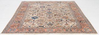 A semi antique Tabriz carpet, c. 290 x 195 cm.
