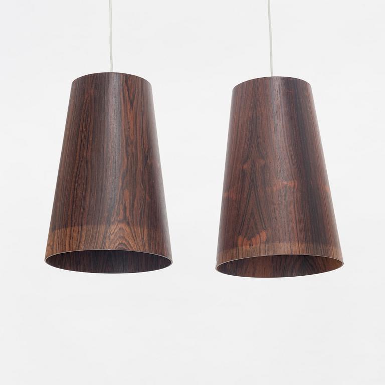 Uno & Östen Kristiansson, a pair of rosewood veneered model 506 ceiling lights, Luxus, Vittsjö, 1960's.