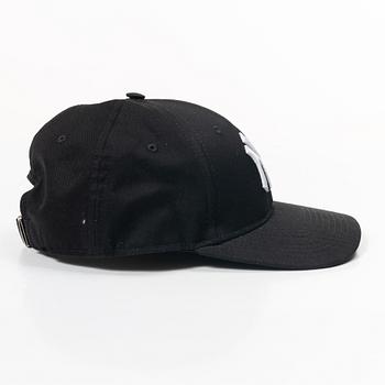 Gucci, NY Yankees baseball cap.