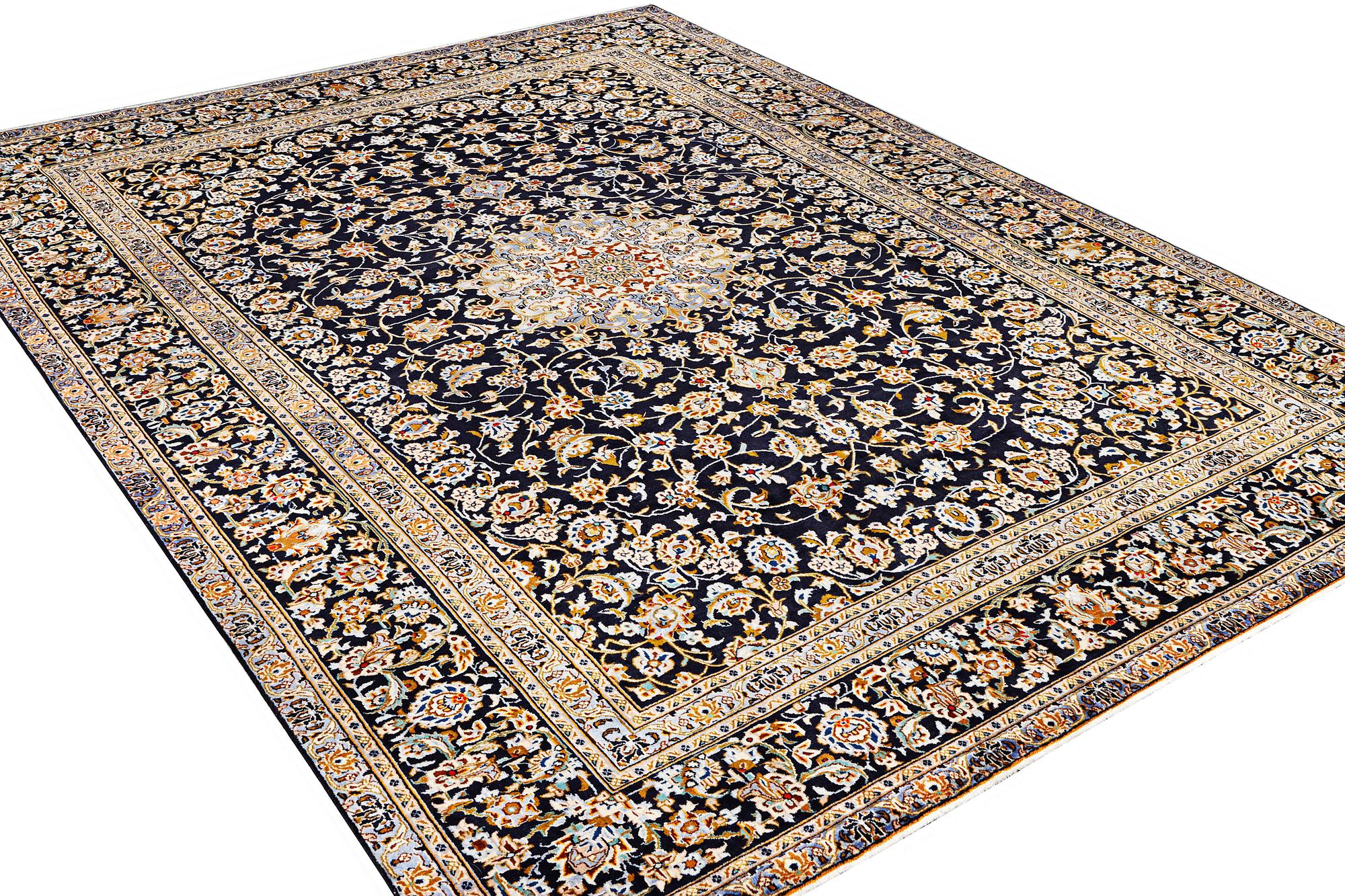 A Kashan carpet, c. 413 x 308 cm.
