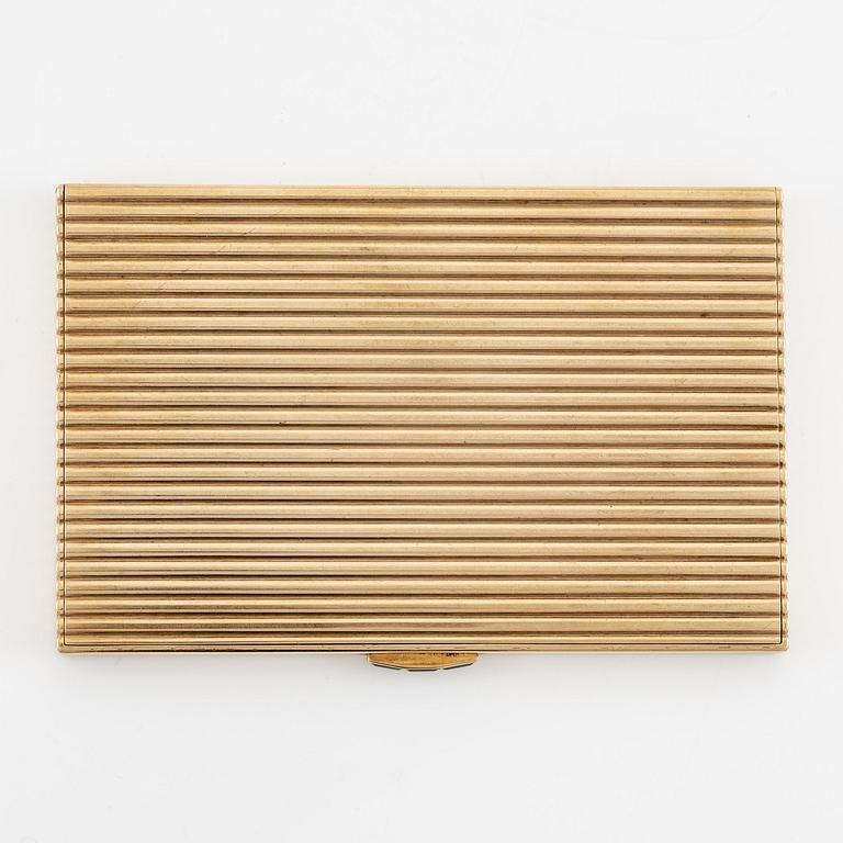 A Cartier 9 carat gold and calibré-cut sapphires cigarette case, London.