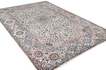 A Nain carpet, part silk, 9 laa, c. 453 x 298 cm.
