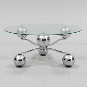 A 1960s / 70s coffee table with glass top.