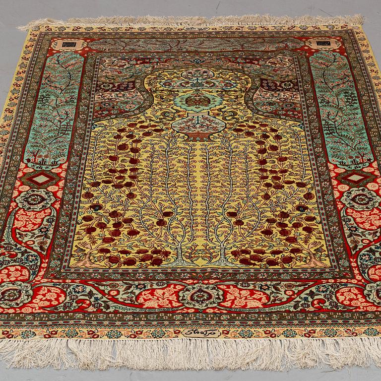 A CARPET, Oriental silk souf (relief), probably Chinese ca 184,5 x 124 cm.