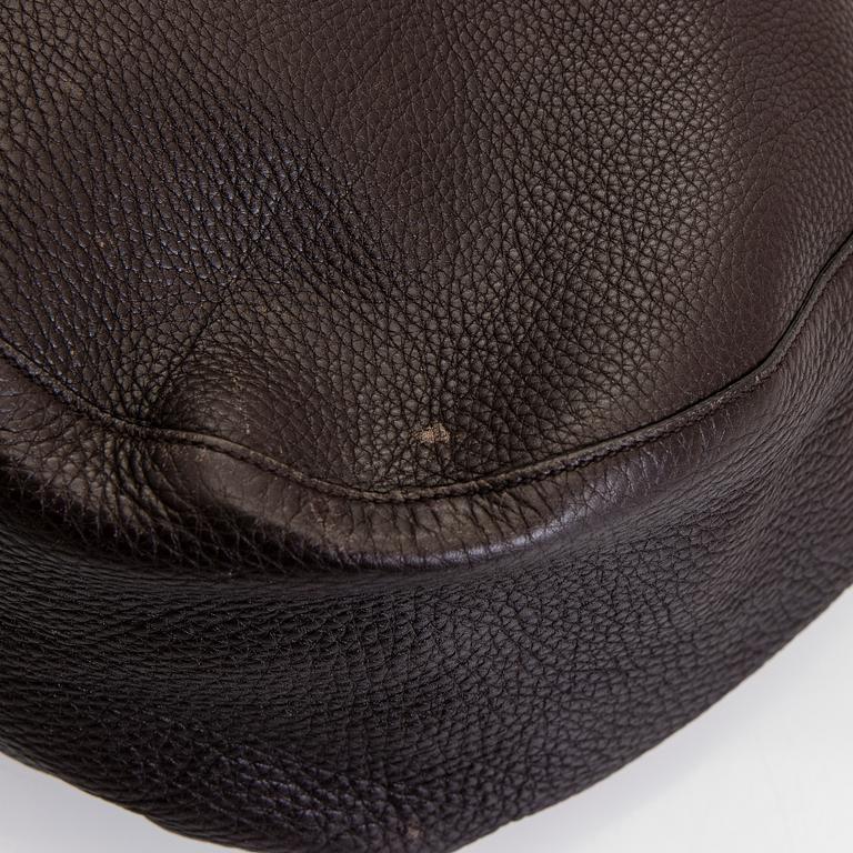 Gucci, an "Interlocking G" bag.