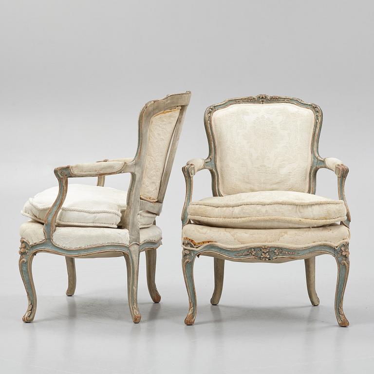 A pair of  Rococo style armchairs, circa 1900.