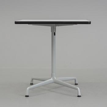 A small "Aluminium group" table by Charles and Ray Eames for Vitra.