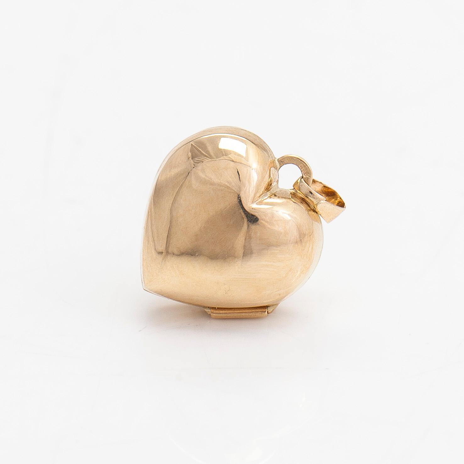 Pendant/locket, heart-shaped, 14K gold and a diamond approx. 0.02 ct.