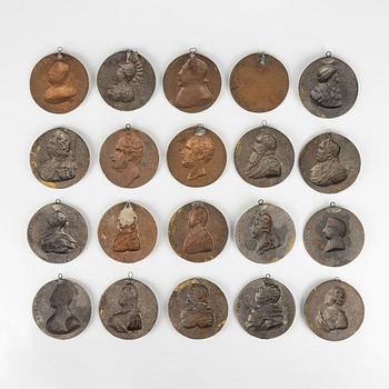 Twenty metal medallions of Swedish kings and queens, 20th century.