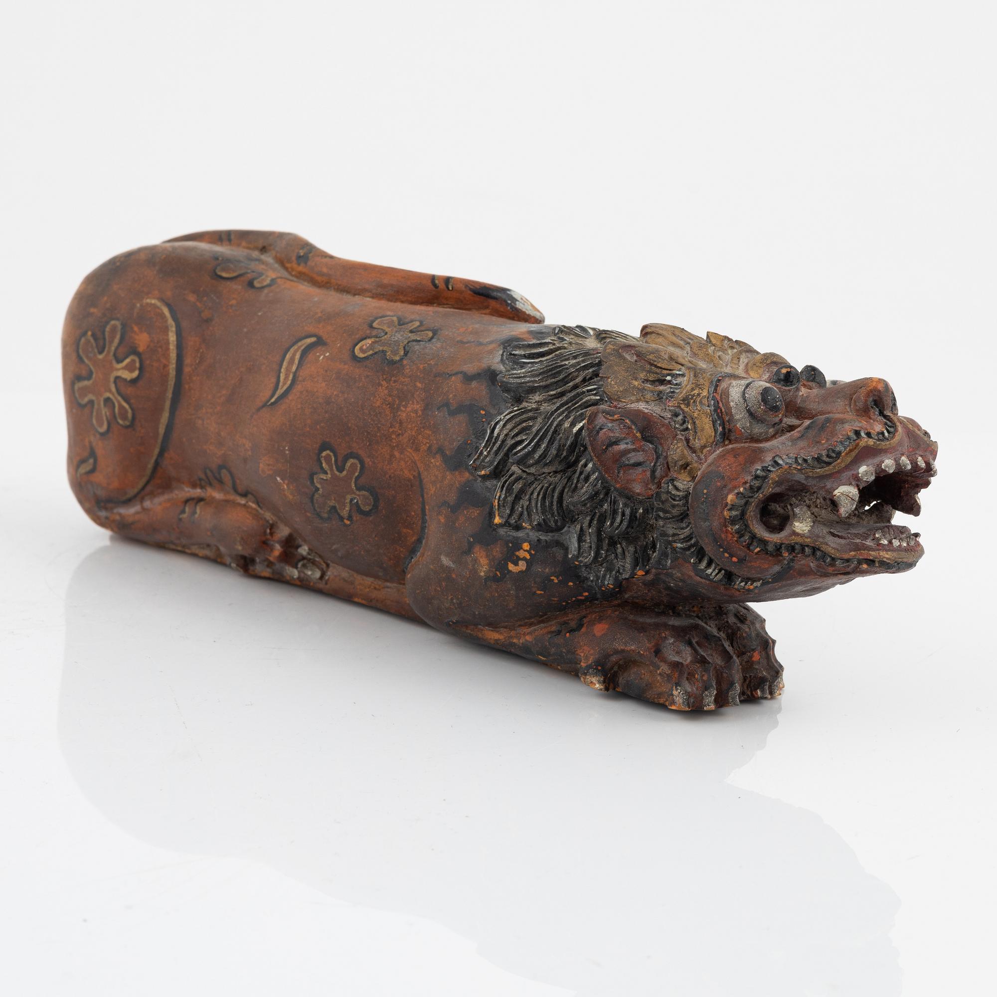 A wooden sculpture, South East Asia, 20th Century.