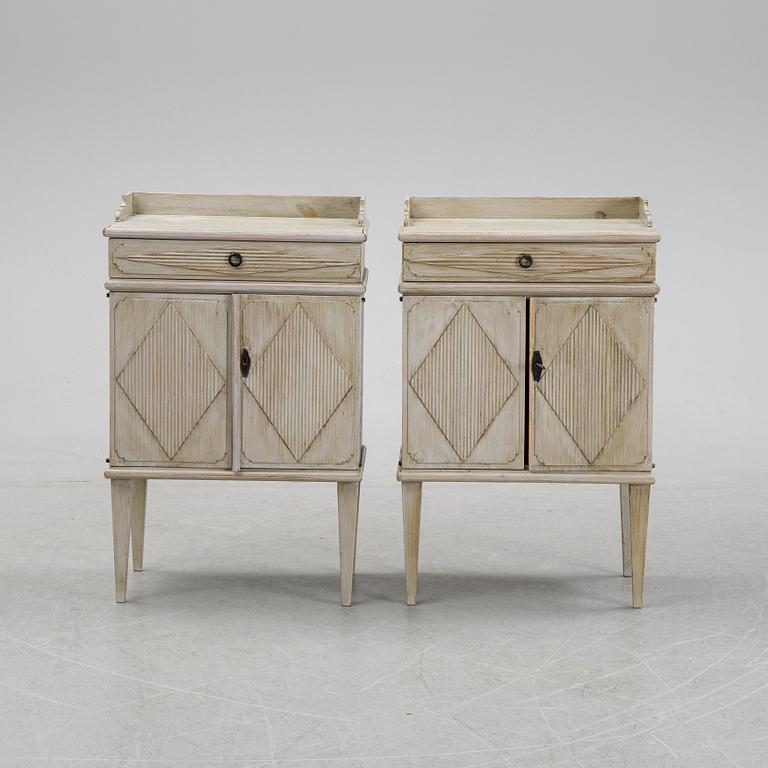 A pair of Gustavian style bedside tables, first half of the 20th century,.