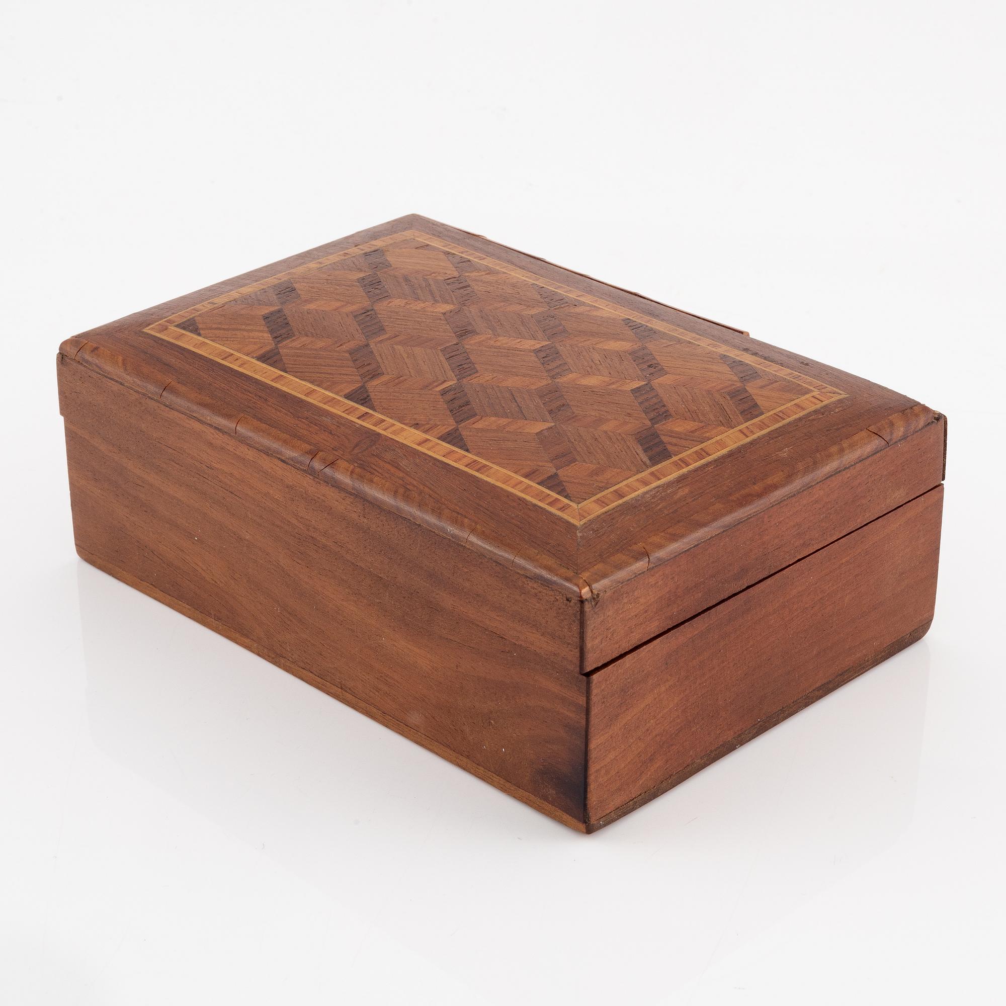 A ring in 18K white gold set with a yellow faceted tourmaline and rose-cut diamonds.