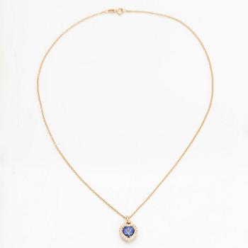 An 18K gold necklace, with a heart-shaped tanzanite and brilliant-cut diamonds.