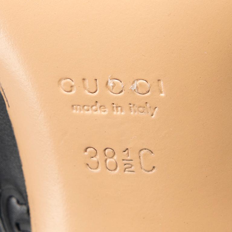 SKOR, Gucci.