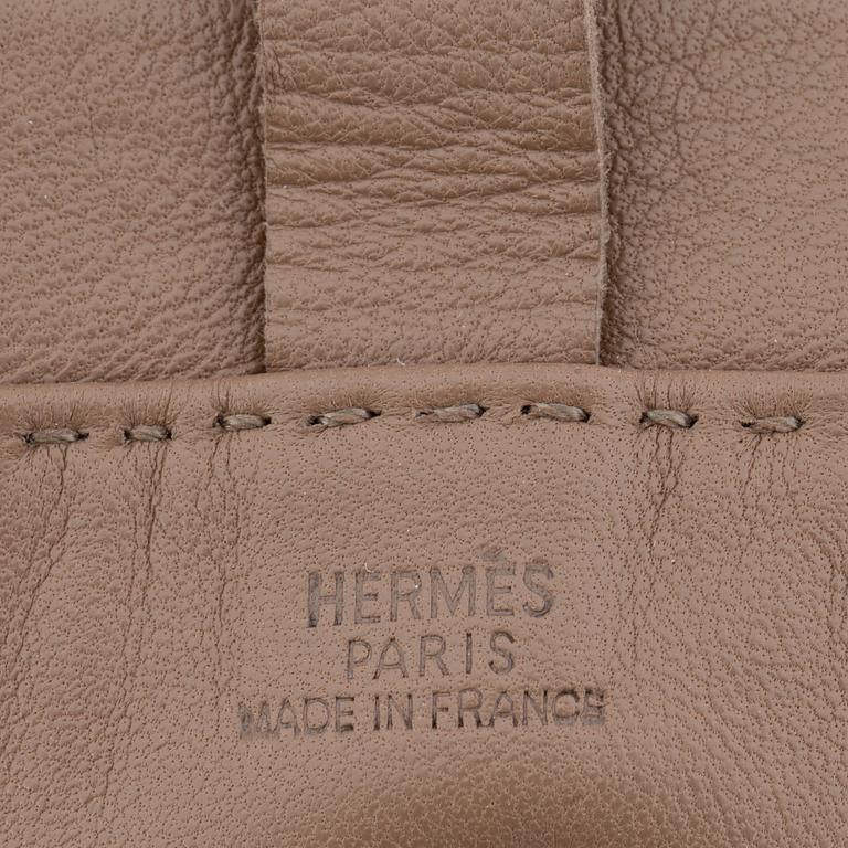 HERMÈS, a small veau swift etoupe shoulder bag.