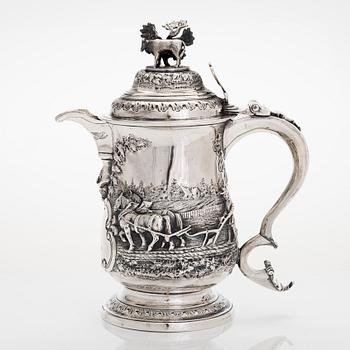 A George III sterling silver jug, maker's mark of John Deacon, London 1772.