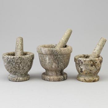 THREE SWEDISH GREEN MARBLE MORTARS AND PESTLES.