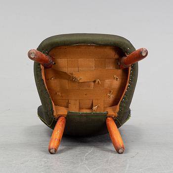 A Swedish Modern 'Clam Chair'/ 'Muslingestol', 1940's-50's.