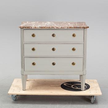 A Gustavian style chest of drawers, 20th Century.